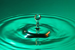 nice blue droplet splashing in a clean water